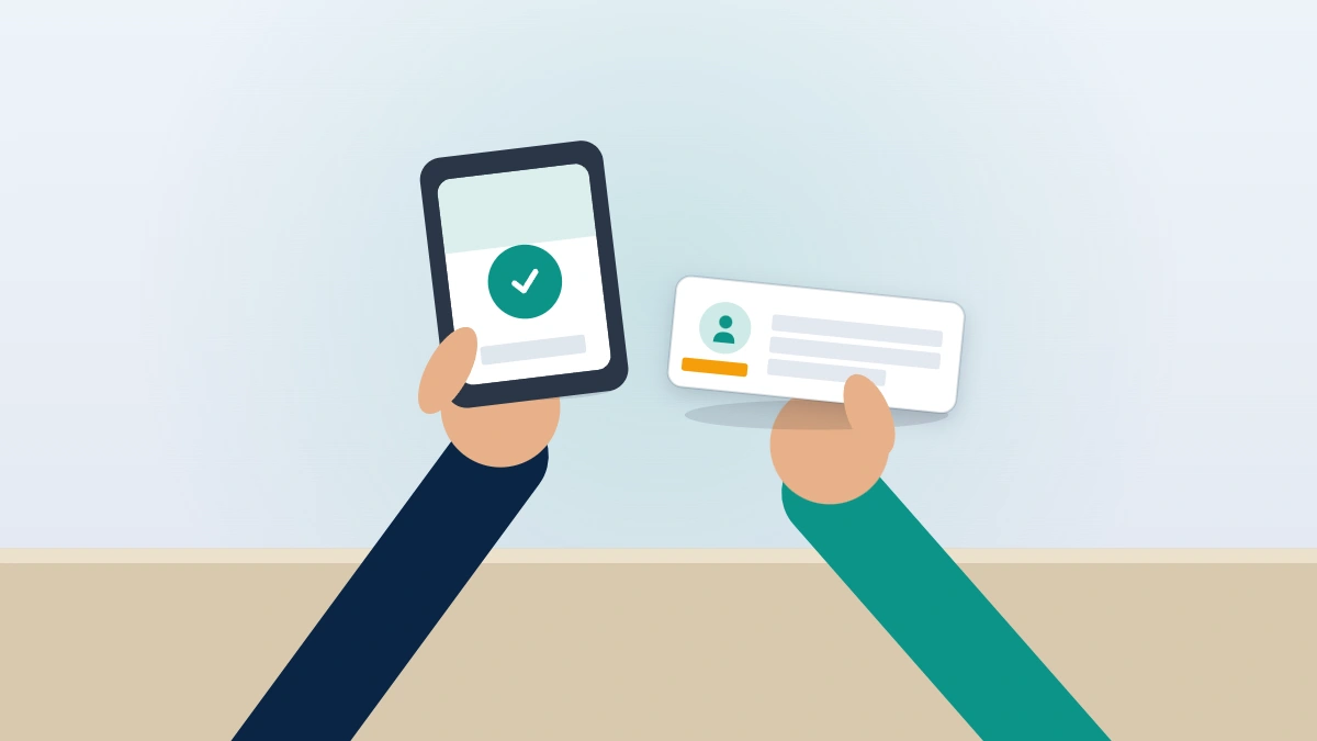 Hands holding a phone and ID card to complete identity verification for Facebook suspended account recovery.