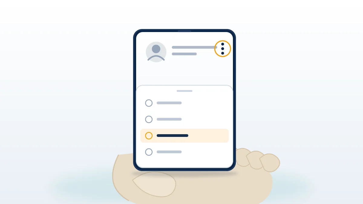Hands holding a phone on the profile Options menu, the first step in reporting an Instagram account.